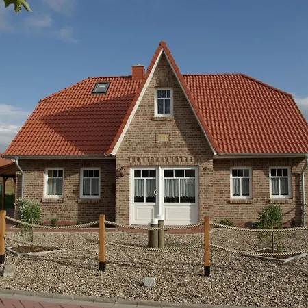 Holiday home Wellness Mit Sauna Und Kaminofen Sowie Carport Und Terrasse Krummhoern